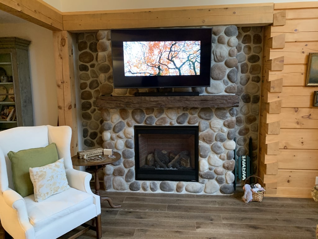 Stone and brick fireplace masonry project in Prince Edward Island