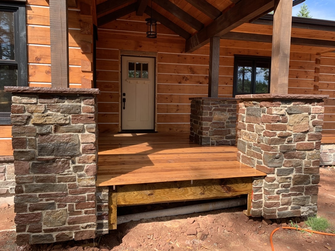 Natural limestone entrance pillars built by DinoMac Masonry